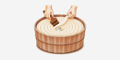 반죽을 통에 말아 넣는 이미지